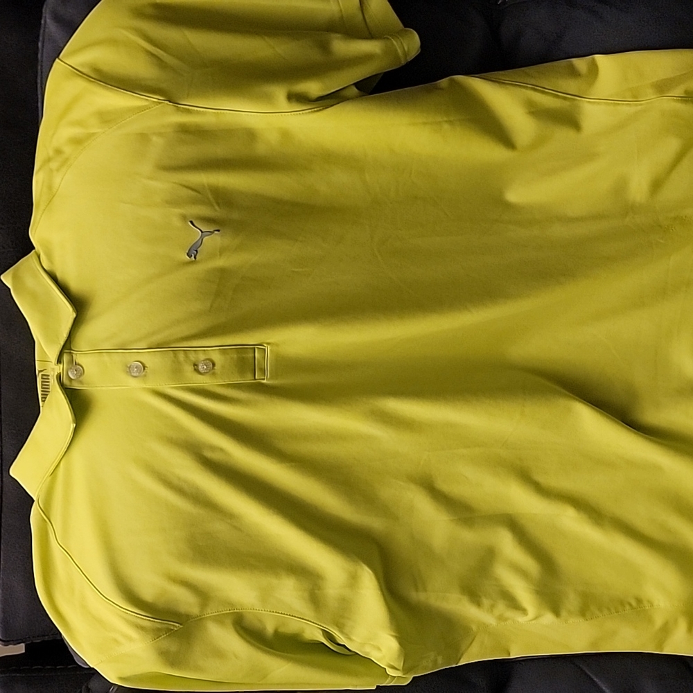 Size XL Green Puma shirt sleeve polo shirt. 100% polyester. Great condition.